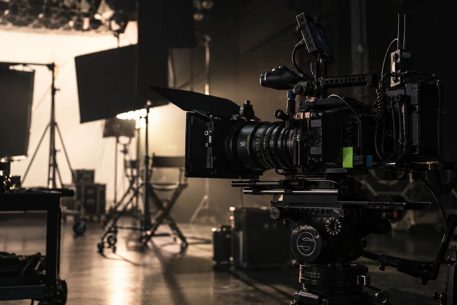Cinema camera on a moody film set, ready for a production shot.